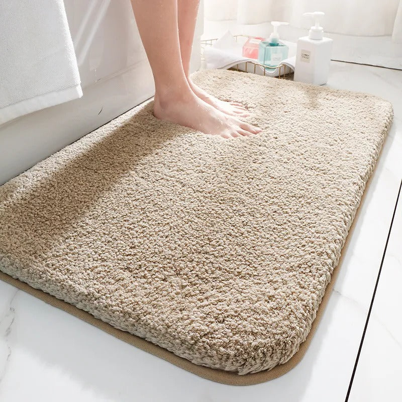 Alfombra de baño suave y antideslizante para un confort diario, absorbente y lavable, ideal para tu baño.