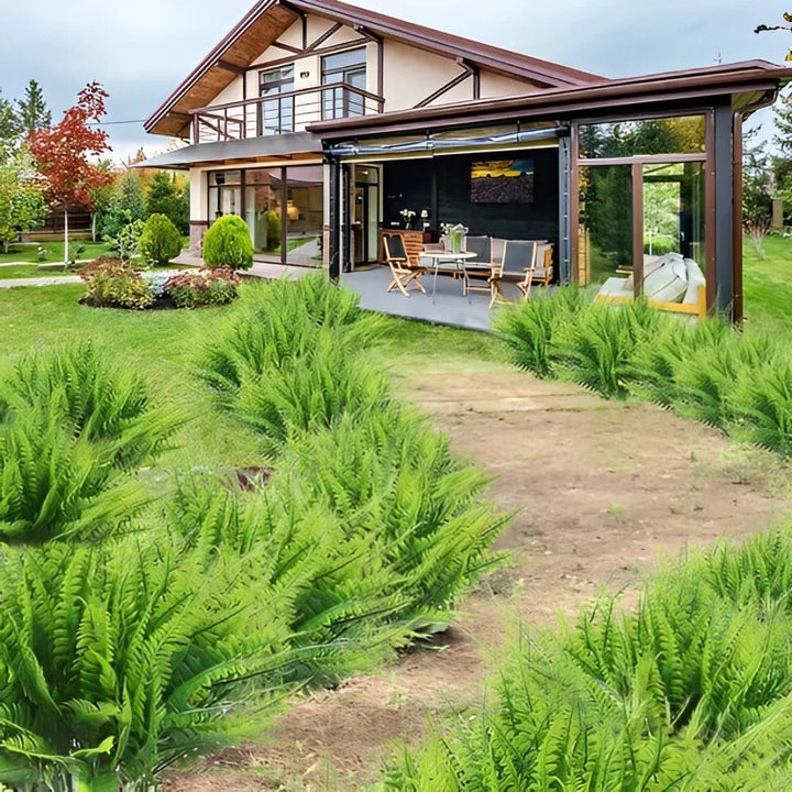 Detalle de helecho artificial realista verde, perfecto para exteriores. Añade frescura UV a tu jardín.