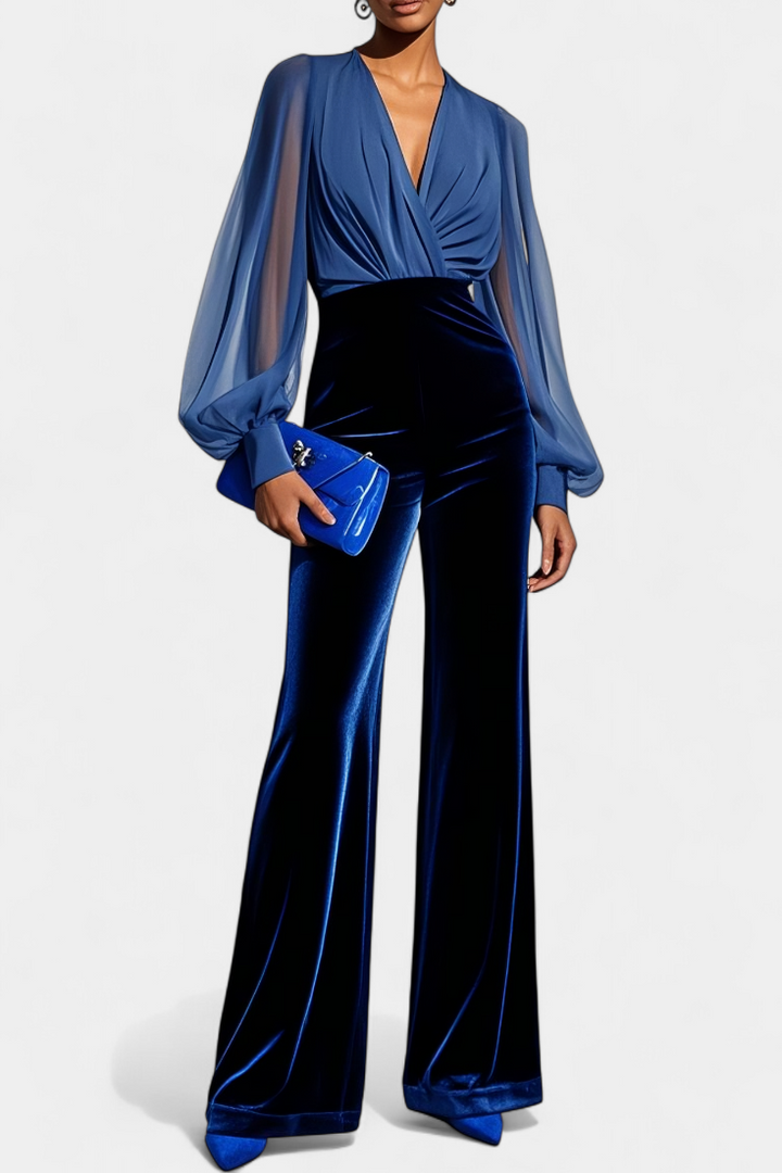 Mono elegante azul para mujer, con escote en V y pierna ancha. Ideal para fiesta o eventos formales.