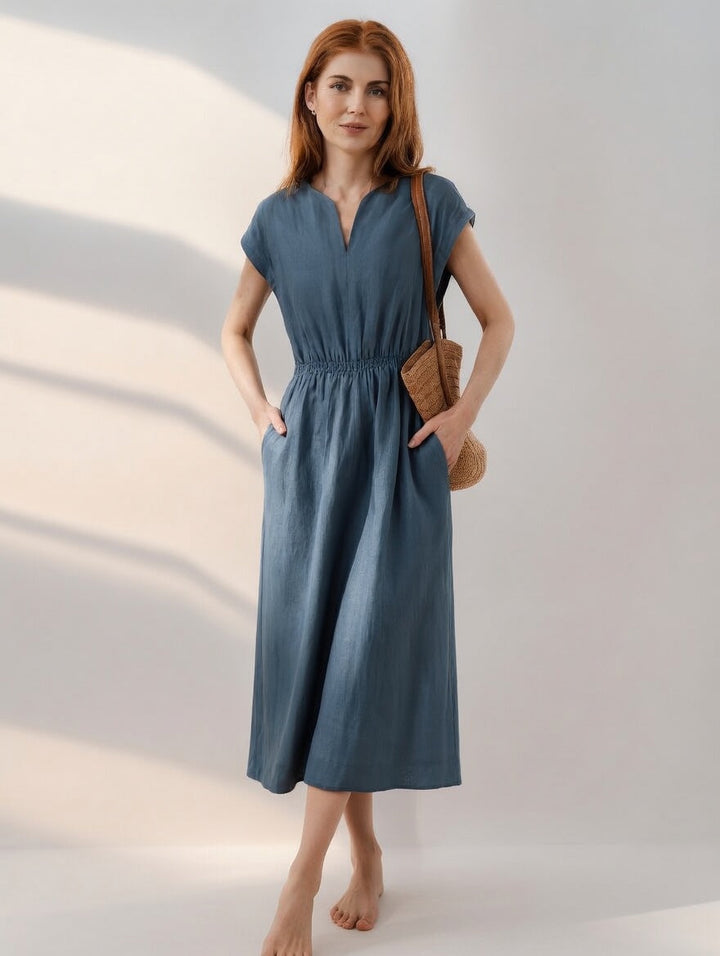 Vestido midi de lino azul marroquí para mujer, con diseño fresco y elegante para un look de verano.