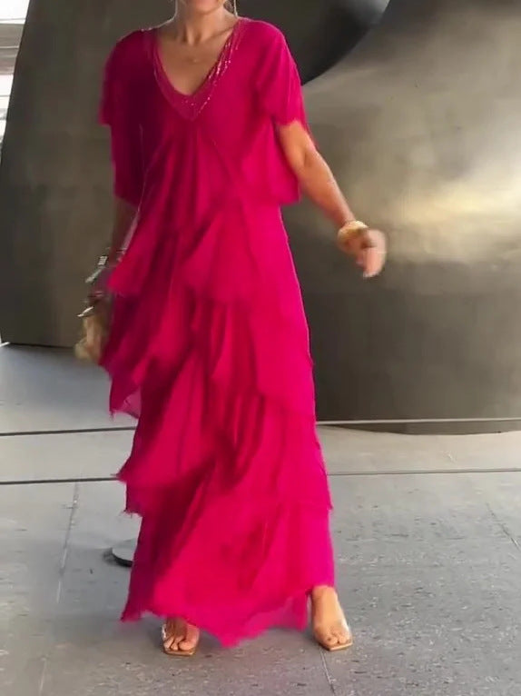 Elegante vestido largo floral para mujer, diseño fluido, manga corta, perfecto para eventos casuales o fiestas.