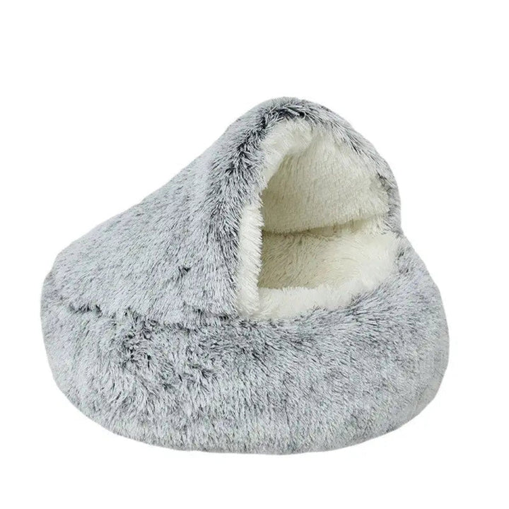 Cama redonda ultrasuave para mascotas. Diseño seguro y acogedor que alivia la ansiedad de tu perro.