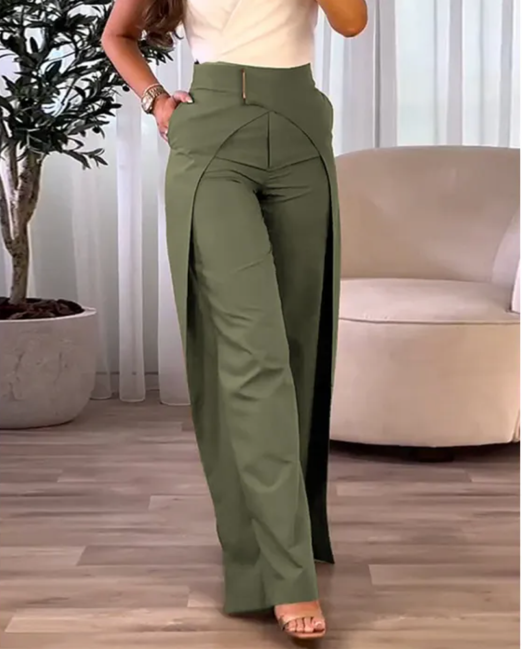 Pantalón de verano talle alto para mujer, con corte fluido y abertura. Estilo elegante y moderno.