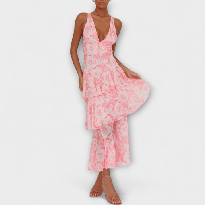 Moderno vestido maxi sin mangas con escote V pronunciado, perfecto para el verano femenino.
