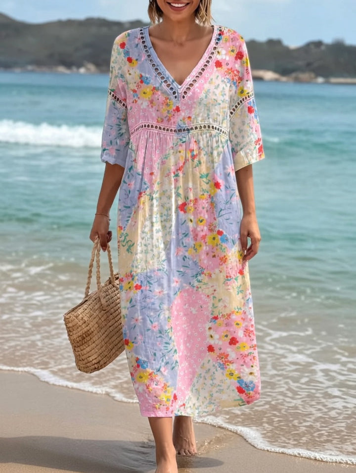 Vestido de mujer floral fluido con escote en V y manga media. Cómodo y transpirable para días de verano.