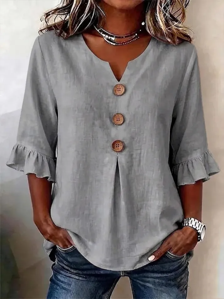 Elegante camisa fluida de mujer, cuello V con botones y manga midi, estilo chic para cualquier ocasión.