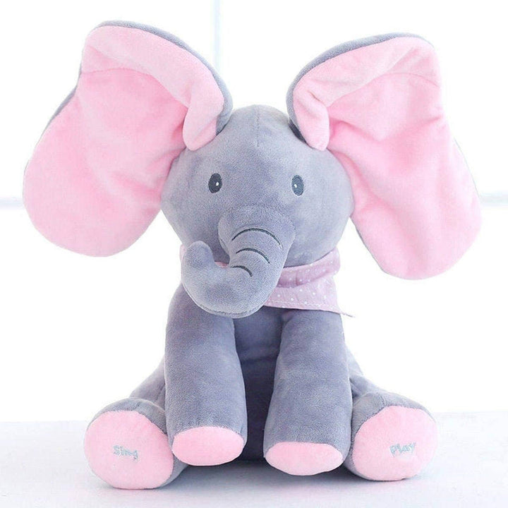 Adorable elefante de peluche que canta y juega al cucú, captando la atención del bebé.