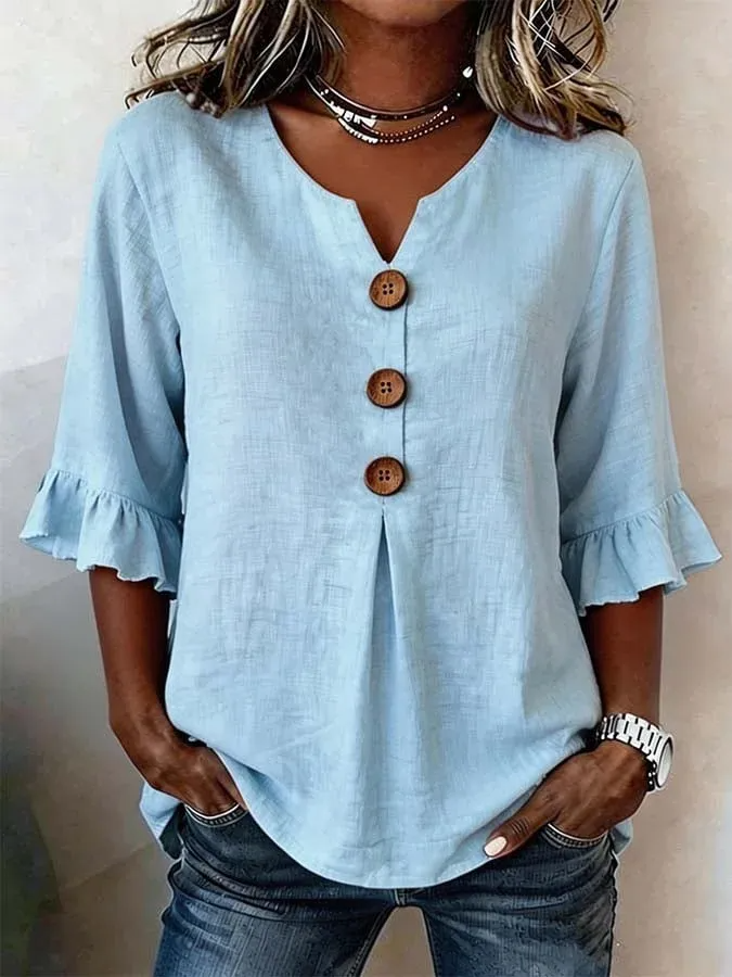 Blusa fluida de mujer con manga midi y cuello V, diseño versátil que ofrece comodidad.