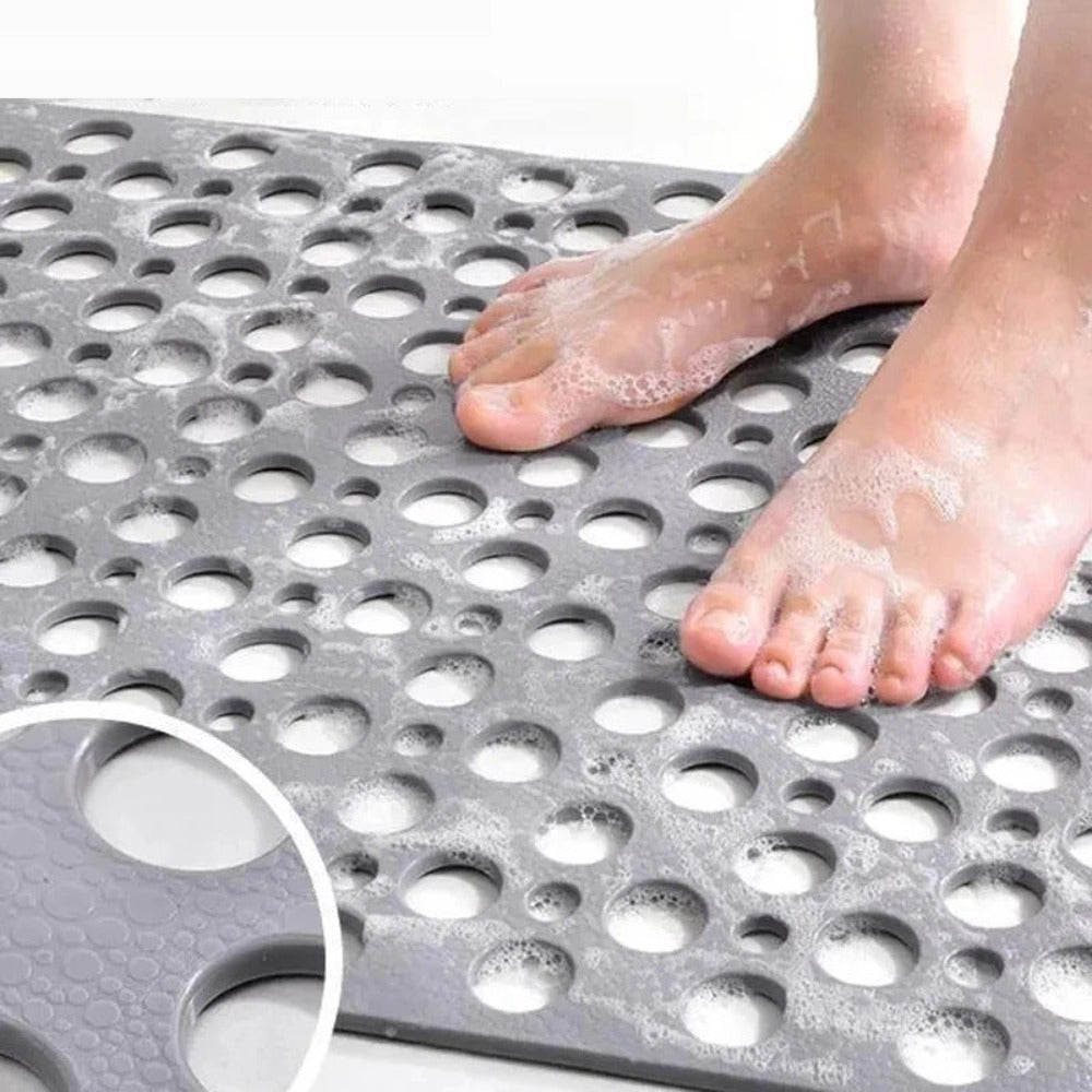 Alfombra de higiene para baño, antideslizante y lavable a máquina, garantiza un entorno seguro y limpio en el hogar.