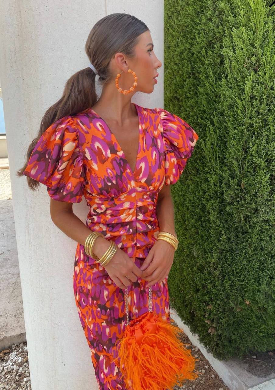 Elegante vestido de fiesta para mujer, con escote en V pronunciado y mangas abullonadas, moda de verano.