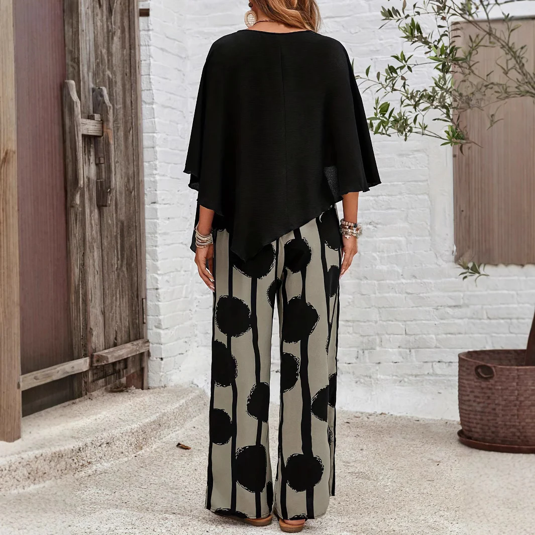 Conjunto negro elegante y cómodo para mujer: top de moda y pantalón fluido versátil. Estilo femenino.