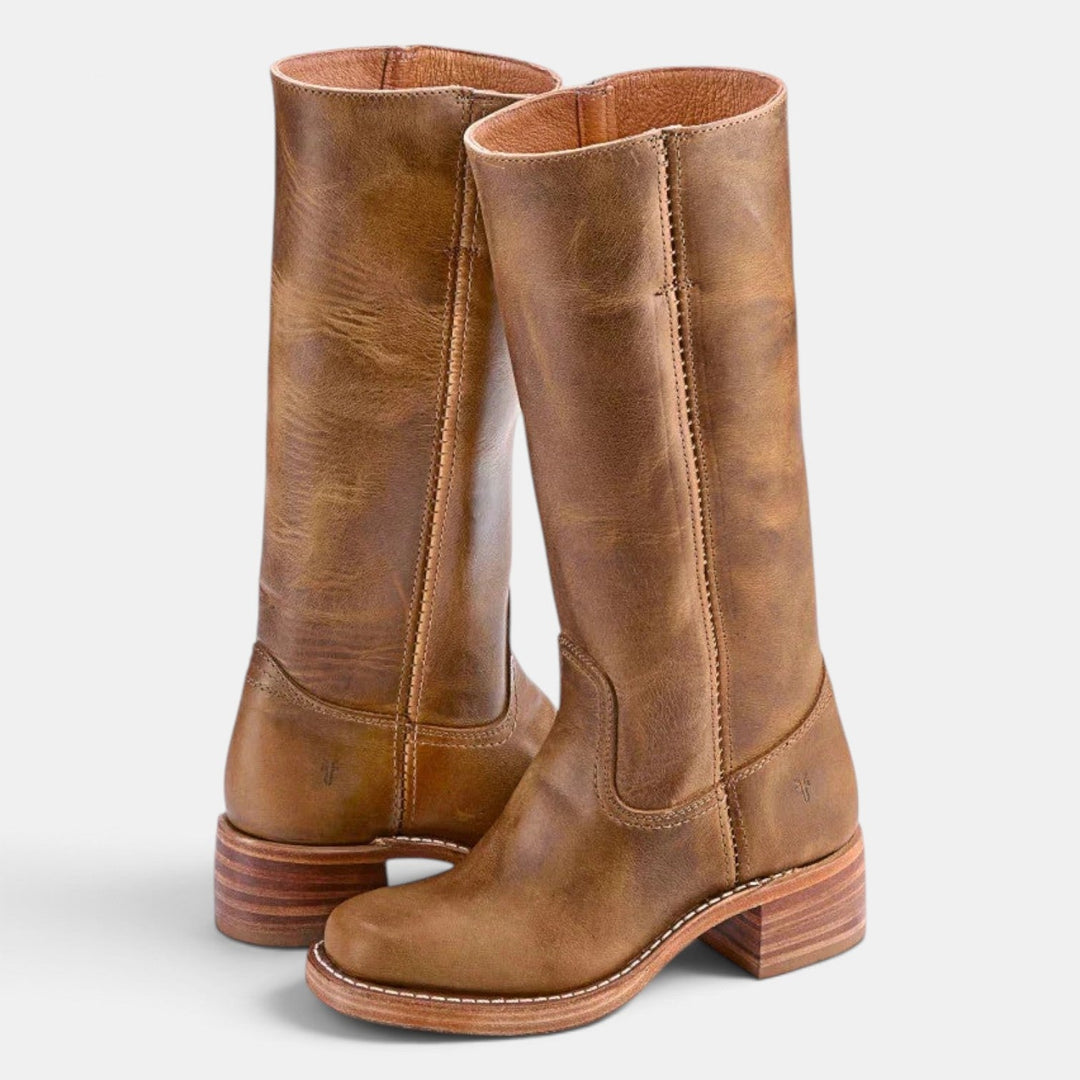 Botas de mujer con diseño de media caña y tacón ancho. Estilo elegante y confort para cada paso.
