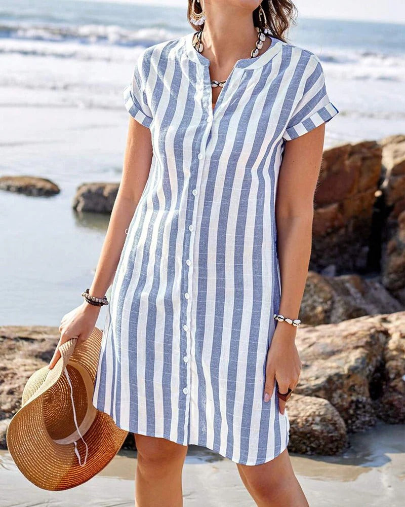 Vestido de verano Oceana azul para mujer, escote V. Estilo fluido, fresco y cómodo, ideal para playa o casual.