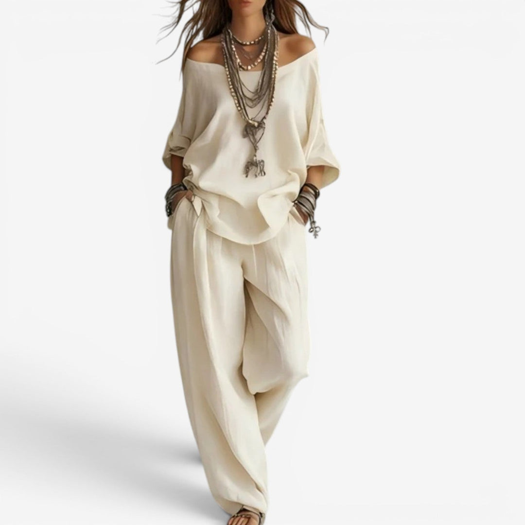 Conjunto bohemio chic y versátil para mujer. Ropa fluida de verano con top hombros al aire y pantalón amplio. Estilo relajado.