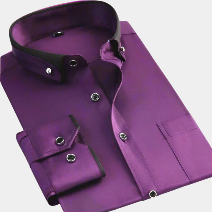 Camisa de vestir para hombre en algodón premium, corte clásico y mangas largas. Elegancia y confort duradero.