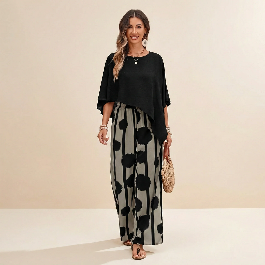 Conjunto de moda femenino, dos piezas: top elegante y pantalón fluido negro. Perfecto para un estilo versátil.