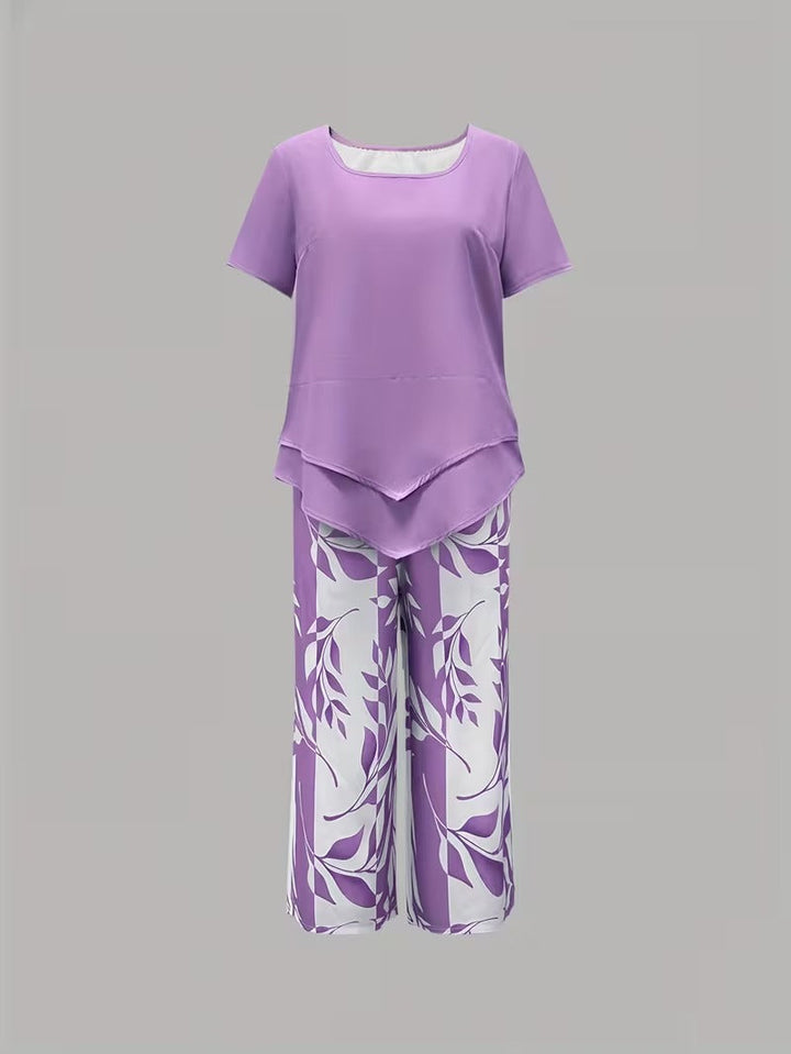 Conjunto de mujer con diseño de hojas tropicales, dos piezas, ideal para un look veraniego.