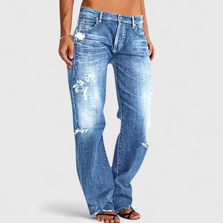 Vaqueros elásticos de mujer con talle bajo y pierna ancha, perfectos para un look casual y cómodo. Denim moderno.