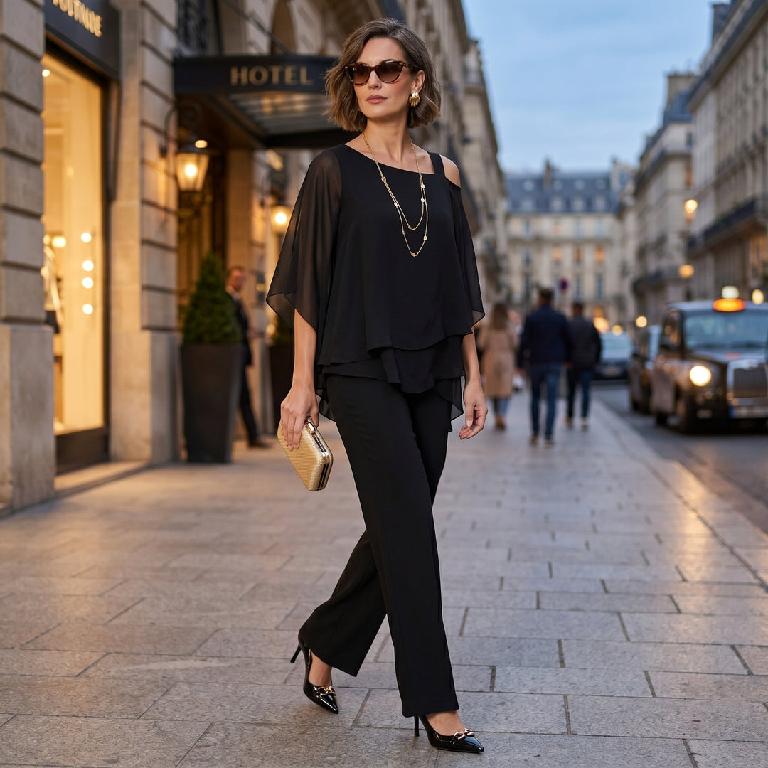 Conjunto de fiesta para mujer, top de gasa asimétrico con detalle de strass y pantalón elegante.