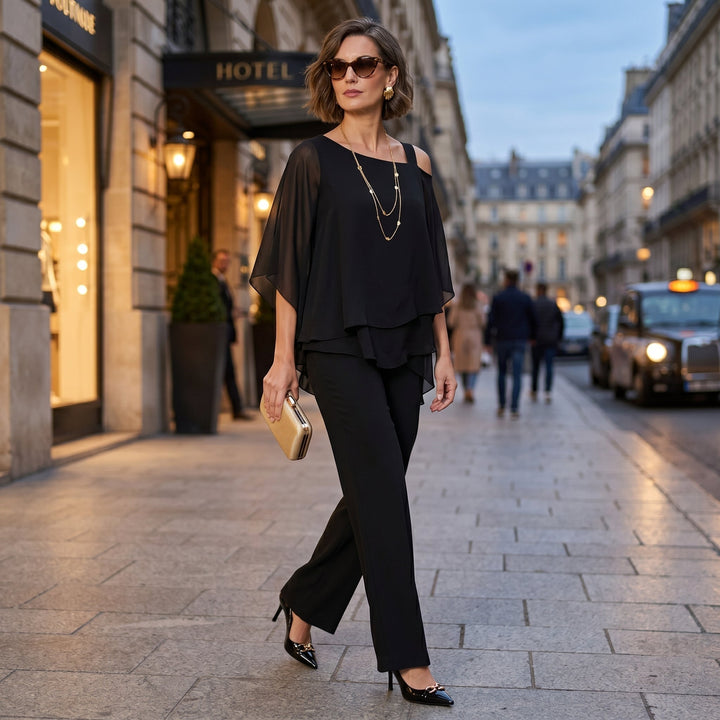 Conjunto de fiesta para mujer, top de gasa asimétrico con detalle de strass y pantalón elegante.
