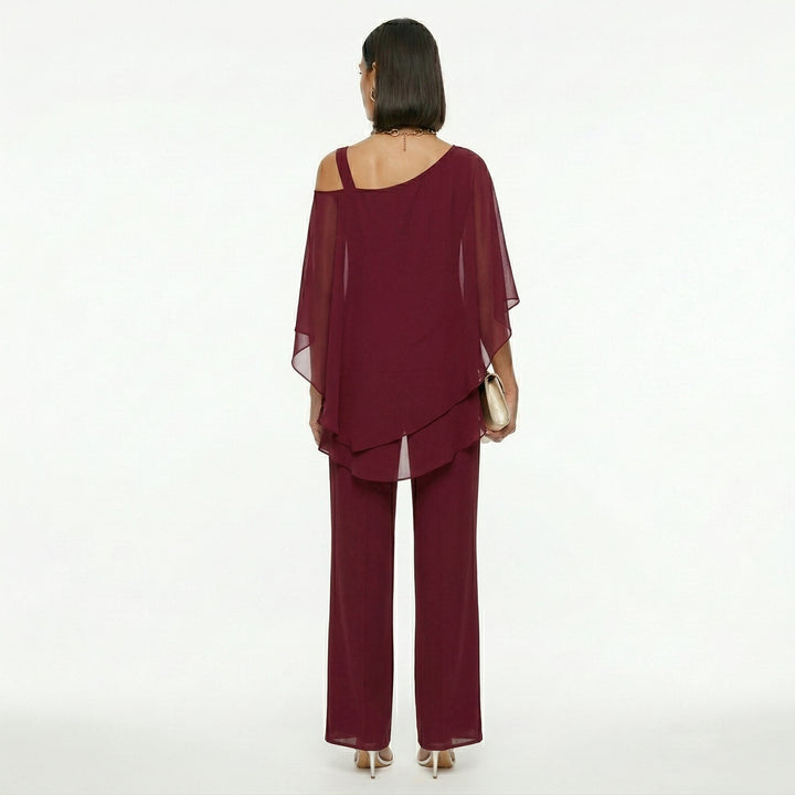 Moda femenina: conjunto de gasa asimétrico de dos piezas, ideal para ocasiones especiales y formales.