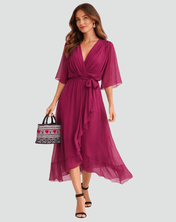 Vestido midi de poliéster, con lazo decorativo y escote cruzado, un estilo formal para mujer.