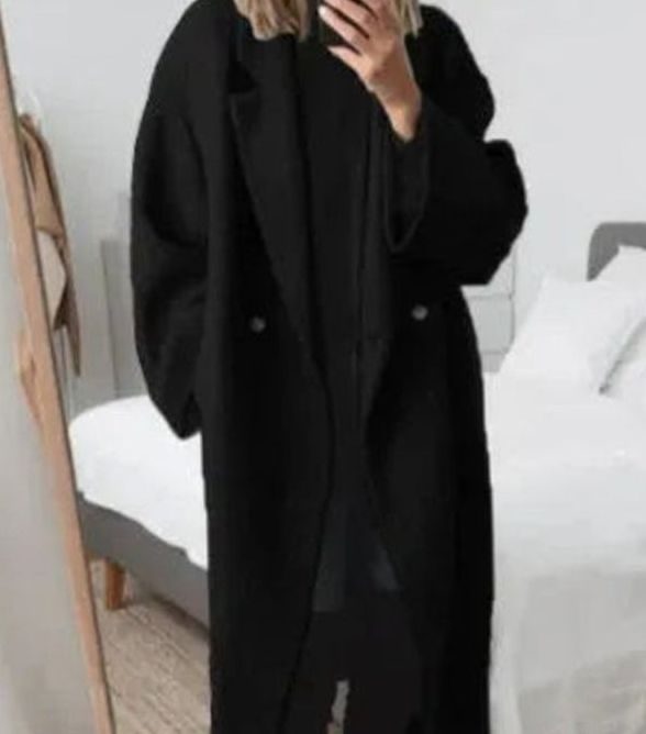 Abrigo largo oversize para mujer, diseño cruzado elegante y suelto, ideal para la moda de otoño invierno.
