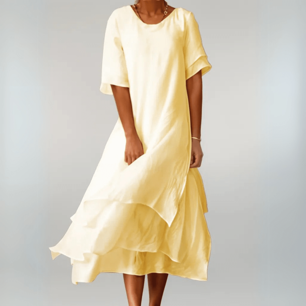 Vestido maxi fluido y femenino para mujer, perfecto para moda de verano. Diseño versátil y fresco.