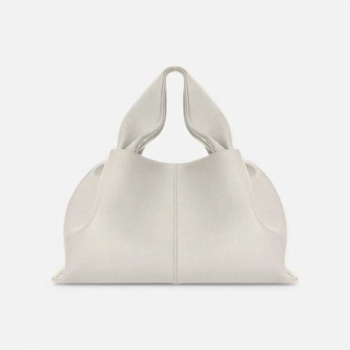Bolso compacto Lina para mujer, ideal para esenciales. Bandolera ajustable y versátil, perfecto para tu día a día.