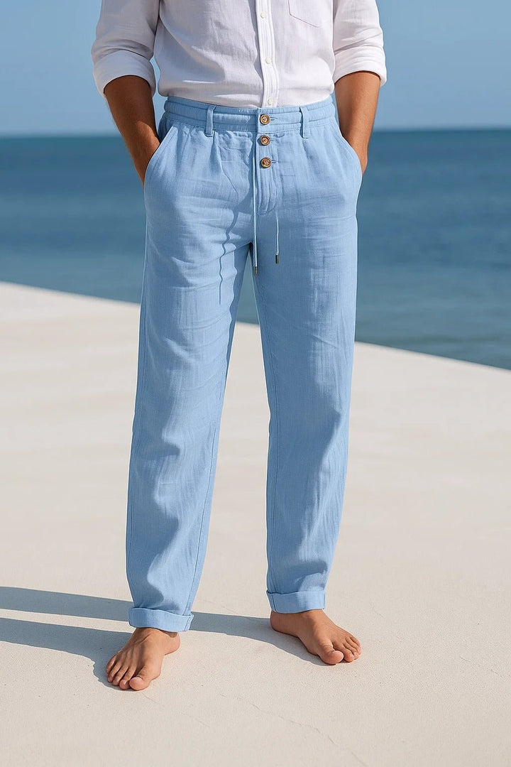 Pantalones de lino fluidos para hombre, con cintura elástica, ideales para un look casual, fresco y de playa.