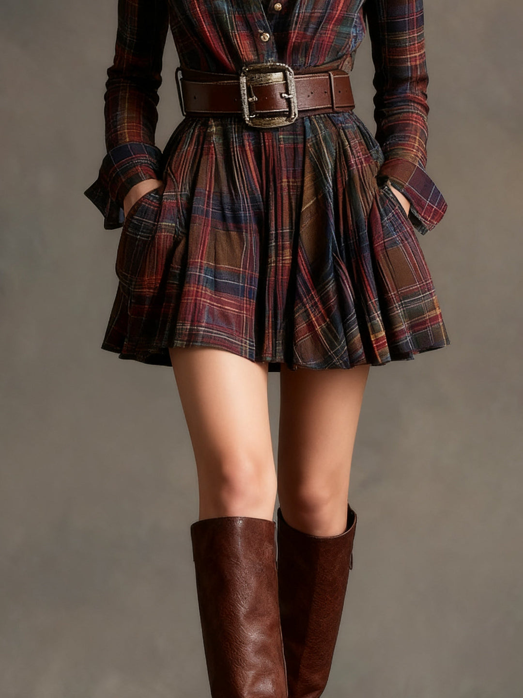 Vestido de cuadros para mujer, estilo camisero y corto, con un elegante cinturón. Una prenda de moda moderna.