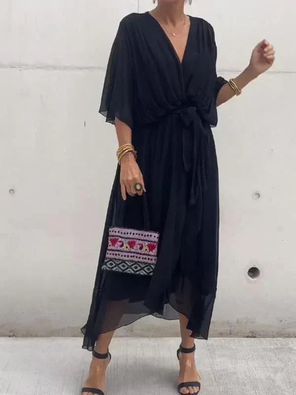 Vestido cruzado midi versátil, ideal para looks casuales o elegantes. Moda femenina de primavera-verano, muy chic.
