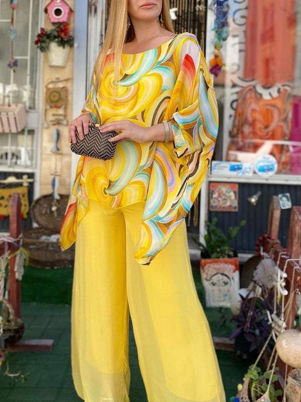 Conjunto de verano mujer: pantalón ancho fluido y blusa con estampado chic, estilo artístico.