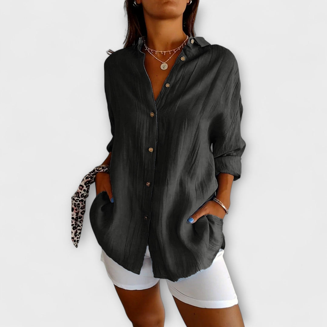 Blusa de moda plisada para mujer, con un toque de elegancia que realza cualquier conjunto.