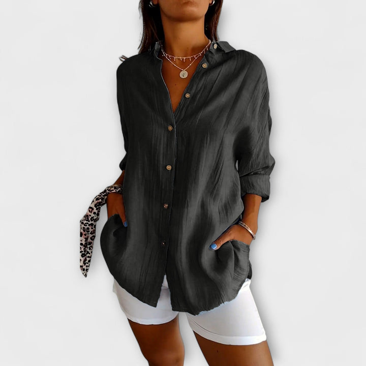 Blusa de moda plisada para mujer, con un toque de elegancia que realza cualquier conjunto.
