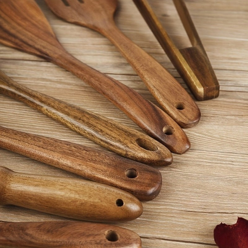 Juego de 7 utensilios de cocina de madera, con espátulas y cucharas, perfectos para cualquier tarea culinaria.