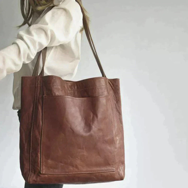 Accesorio de mujer: Bolso tote grande y versátil con gran capacidad.