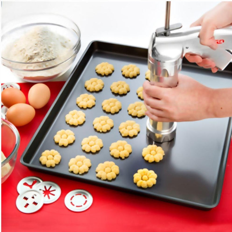 Prensa de galletas profesional de acero inoxidable para repostería, con discos surtidos.