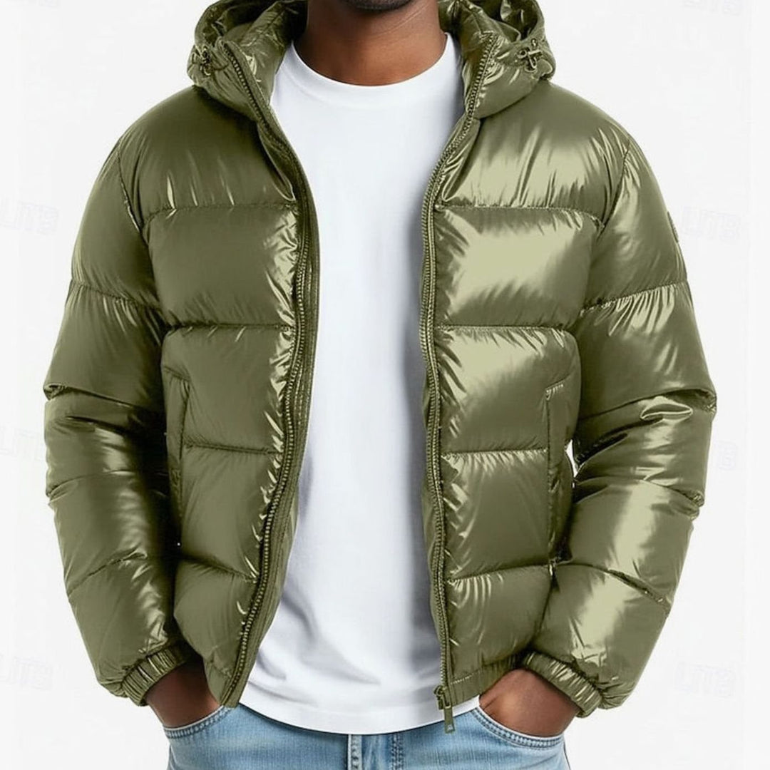 Chaqueta acolchada de hombre con capucha, efecto charol. Abrigo moderno y urbano ideal para invierno.