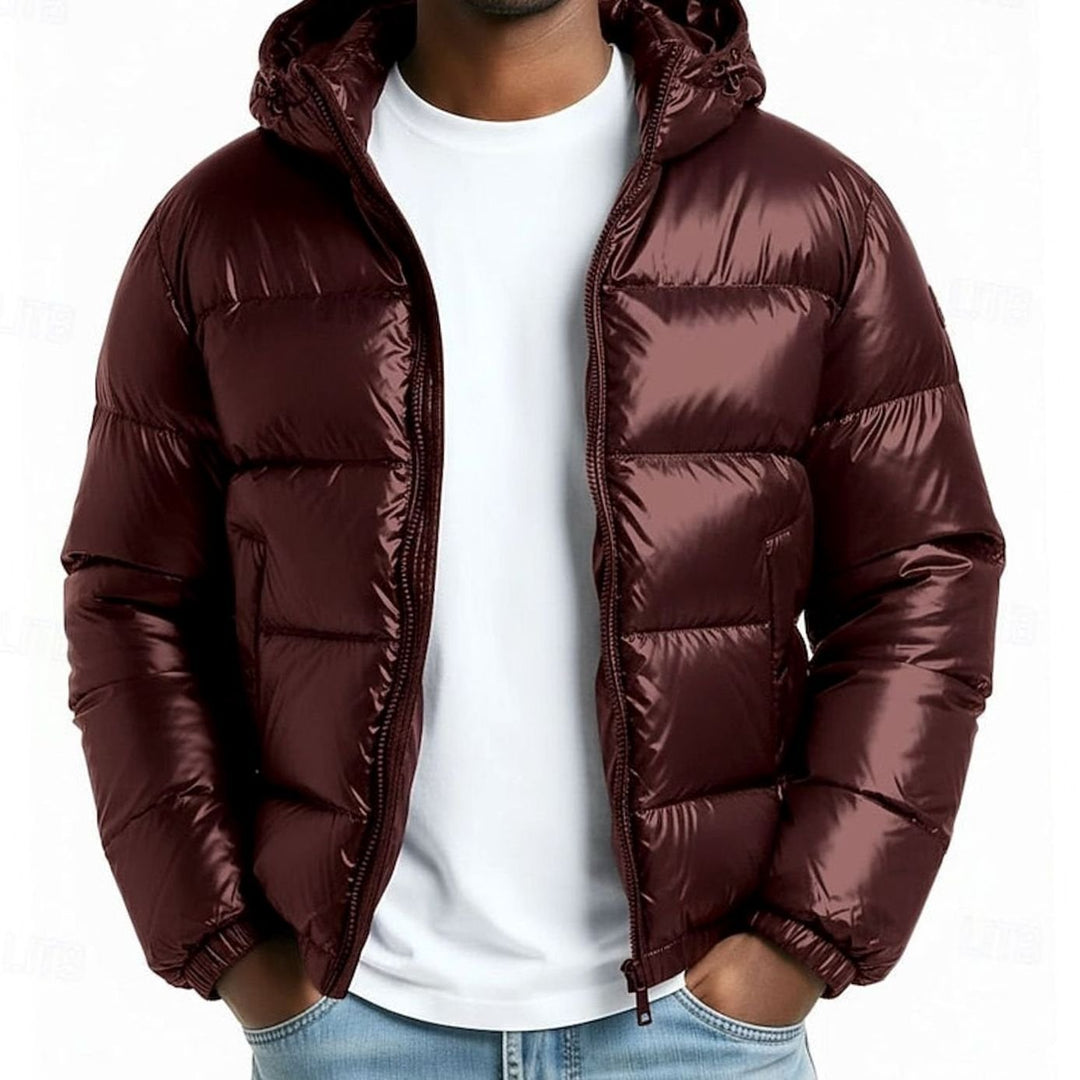Abrigo acolchado para hombre, estilo charol brillante y con capucha. Chaqueta casual para el frío invernal.