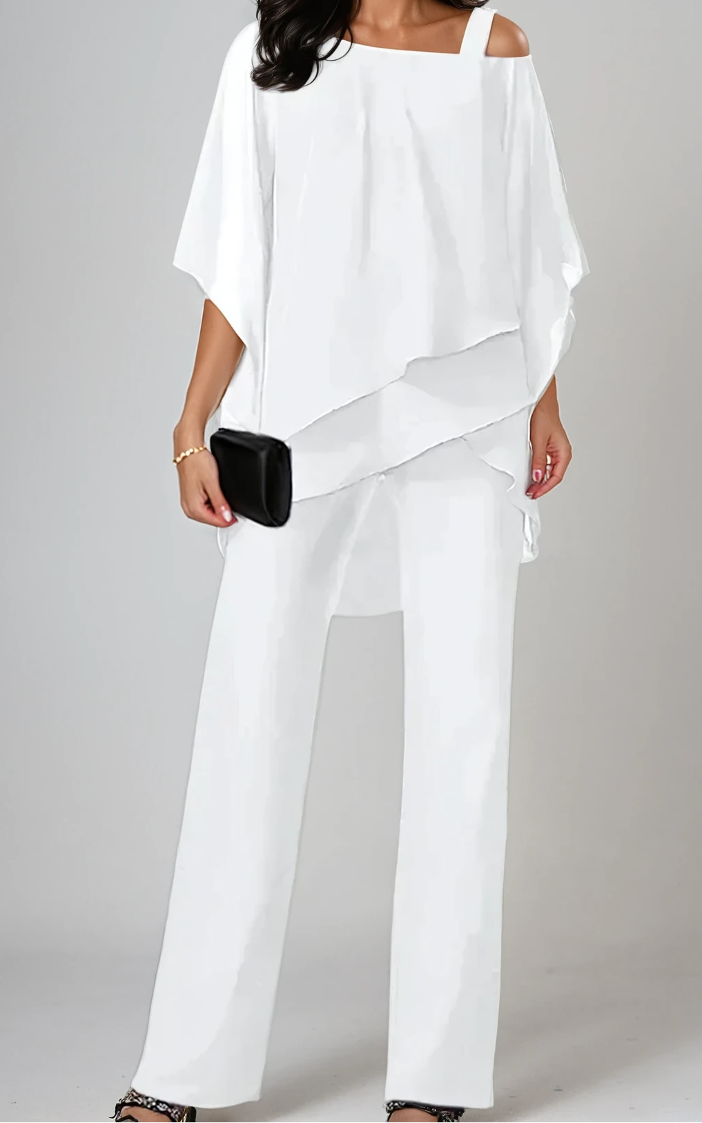 Conjunto versátil de dos piezas para mujer, blusa y pantalón, perfecto para looks de capas en verano.