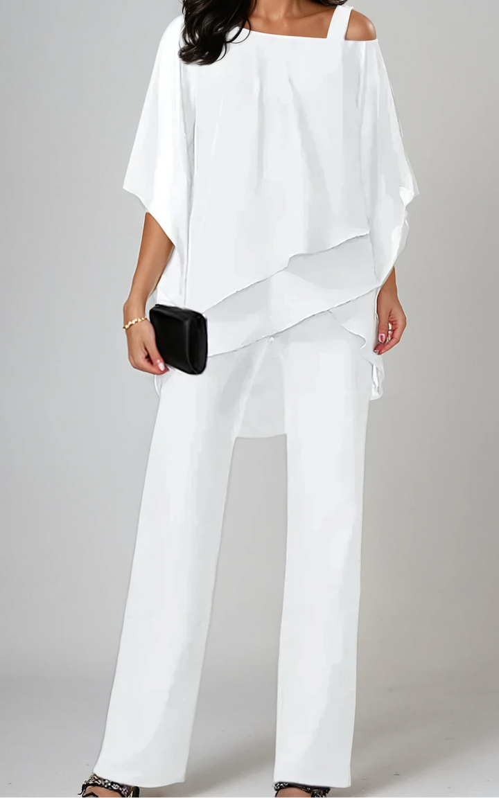 Conjunto versátil de dos piezas para mujer, blusa y pantalón, perfecto para looks de capas en verano.