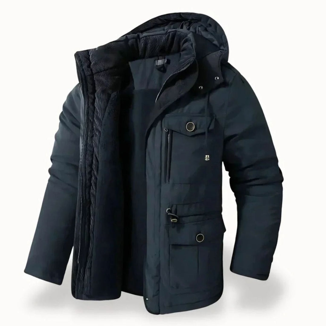 Parka acolchada negra para hombre, con capucha y bolsillos, un abrigo invernal cálido y versátil para uso urbano.