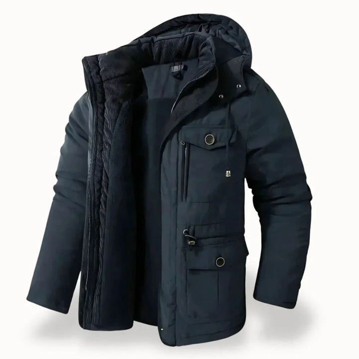 Parka acolchada negra para hombre, con capucha y bolsillos, un abrigo invernal cálido y versátil para uso urbano.