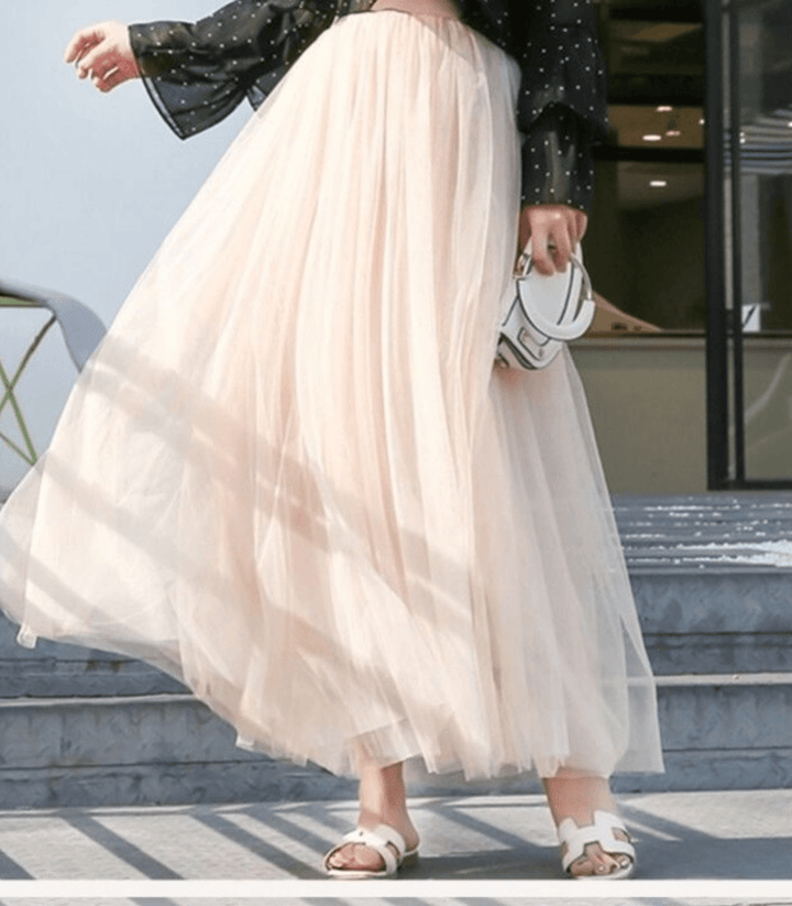 Falda larga mujer, cintura alta estilizada, flujo ligero y versátil. Ropa fresca para moda de verano.