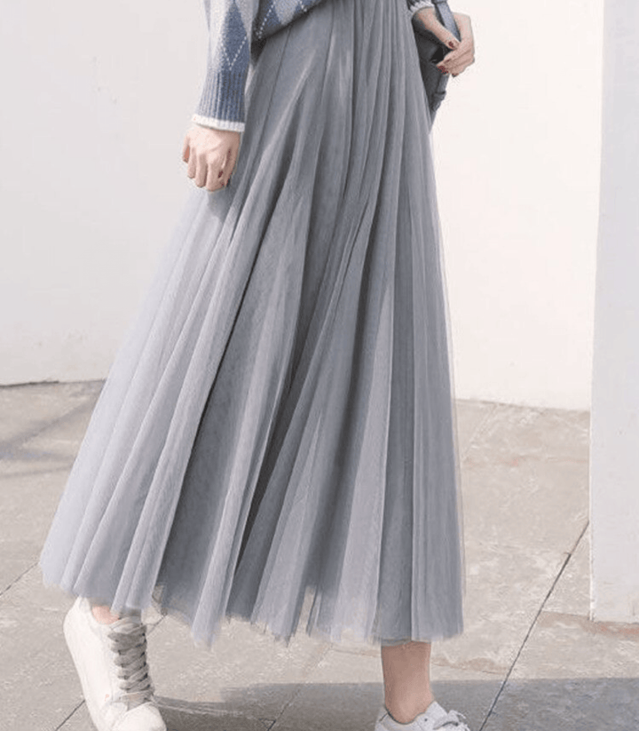 Falda de mujer con cintura alta y caída fluida, estilizada y cómoda, esencial para ropa fresca de verano.