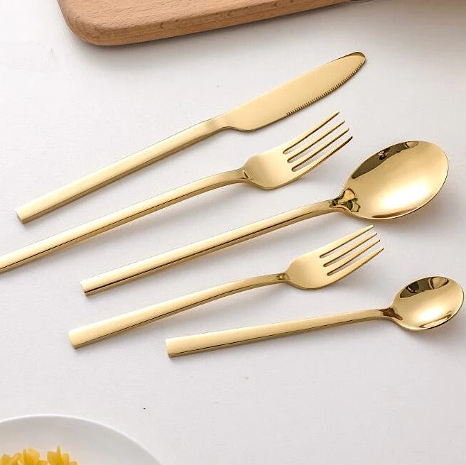 Juego de cubiertos de lujo moderno para 6 personas en acero inoxidable, ideal para comedor elegante.