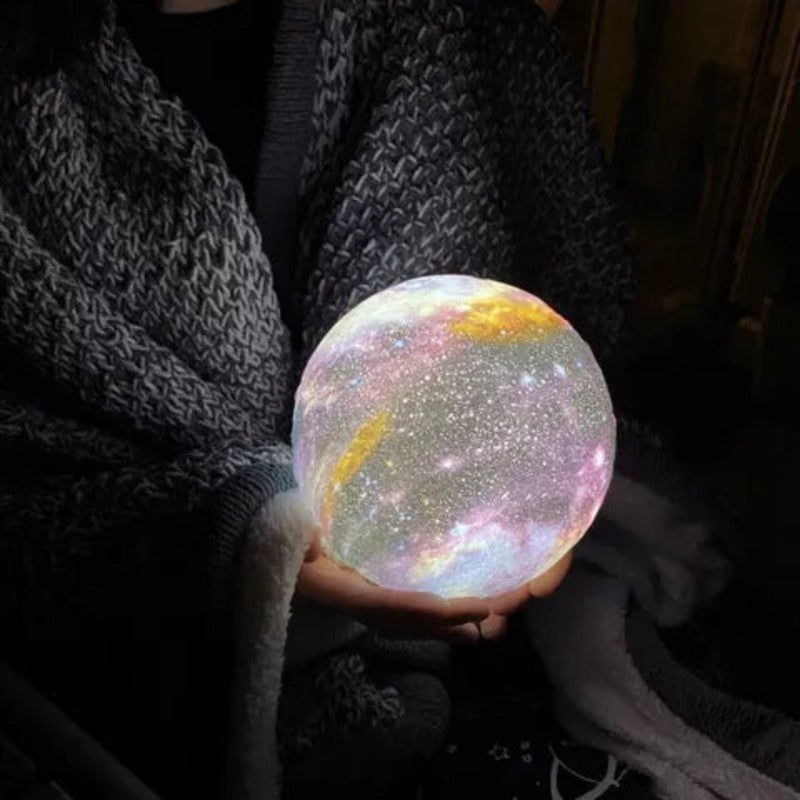 Luz nocturna infantil: lámpara de luna galaxia con 16 colores y control remoto para dormitorio de niños.