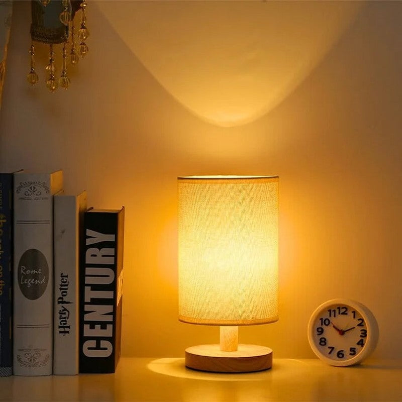 Lámpara LED de mesa cilíndrica, base de madera. Estilo japandi y minimalista con control táctil.