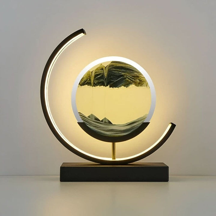 Lámpara de mesa decorativa con arena cinética y luz LED. Un toque moderno y relajante para la iluminación del hogar.
